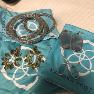Kendra Scott Bracelets and 3 sets of earrings .
